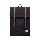 Black backpack with brown straps on a white background