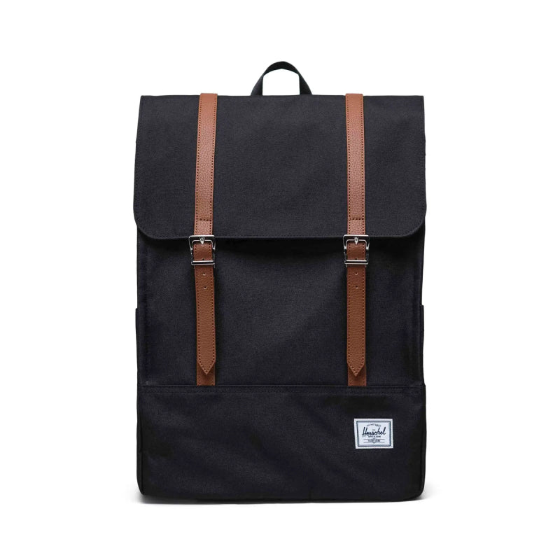 Black backpack with brown straps on a white background
